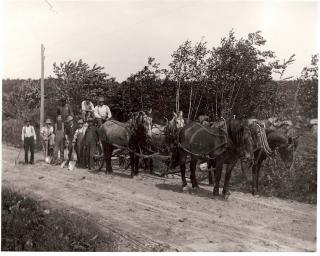Early picture of the HIghway Department with Horses